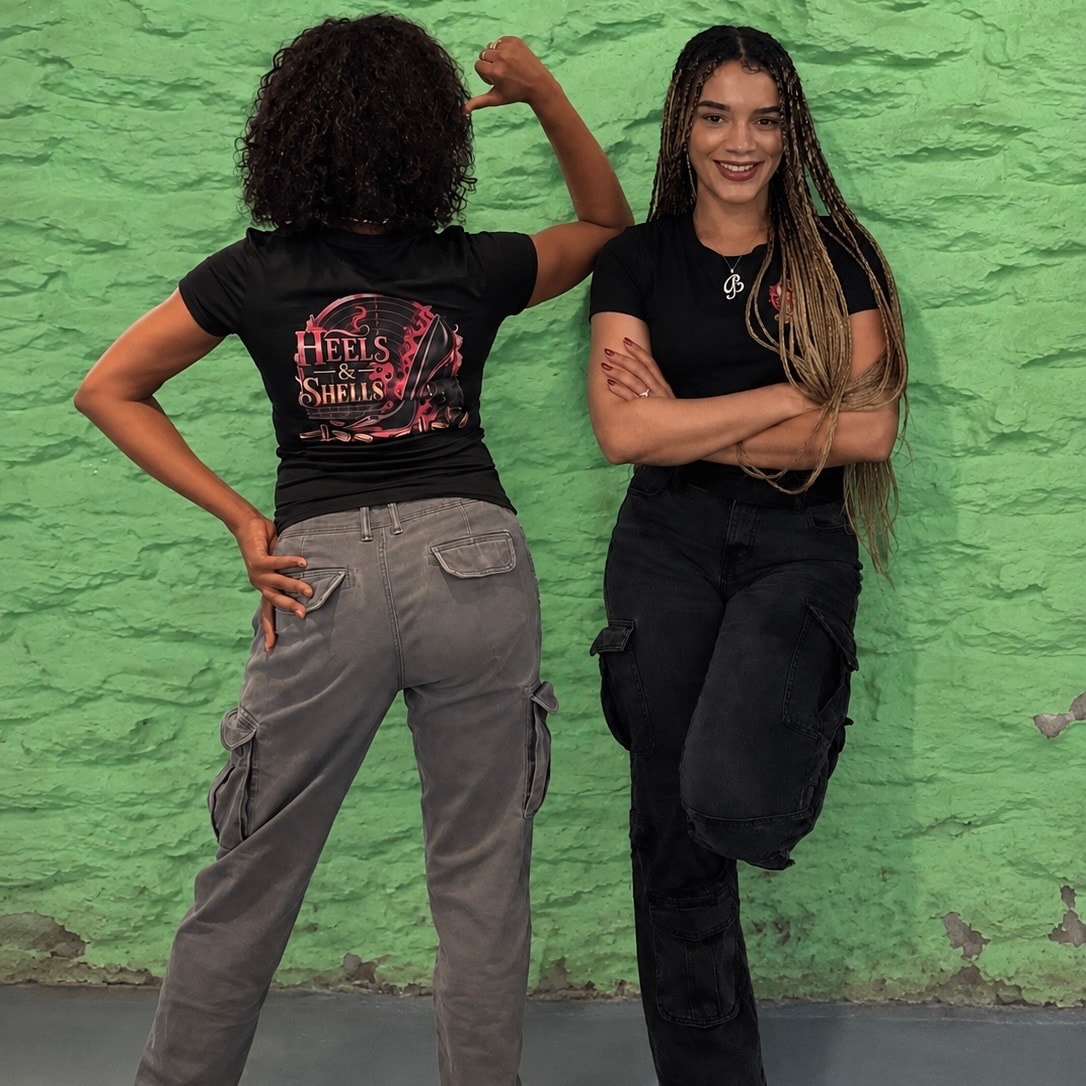 Women learning together in a firearms training class